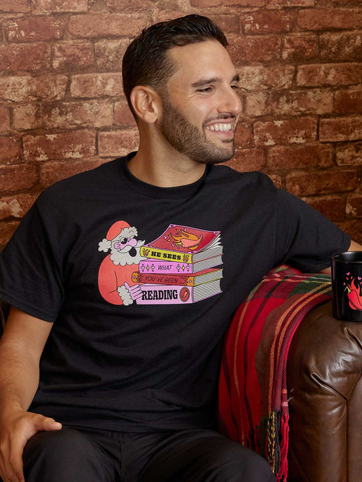 Santa: He Sees What You've Been Reading Unisex T-Shirt