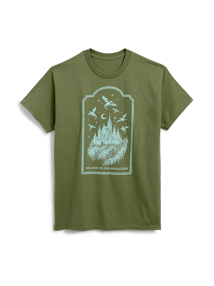 An olive green short-sleeve t-shirt with a light blue graphic print on the front depicting a castle, flying dragons, and the text 'WELCOME TO THE REVOLUTION'.