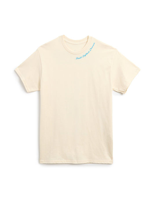 A cream-colored short-sleeve t-shirt with a small light blue cursive graphic 'Read. Reflect. Connect.' on the upper chest, displayed flat against a solid white background.