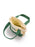 A small canvas pouch with green fabric handles and trim, a cream-colored interior, and a gold-tone key ring attachment. The front of the pouch features the text 'Book Babe' with a small yellow flower logo.