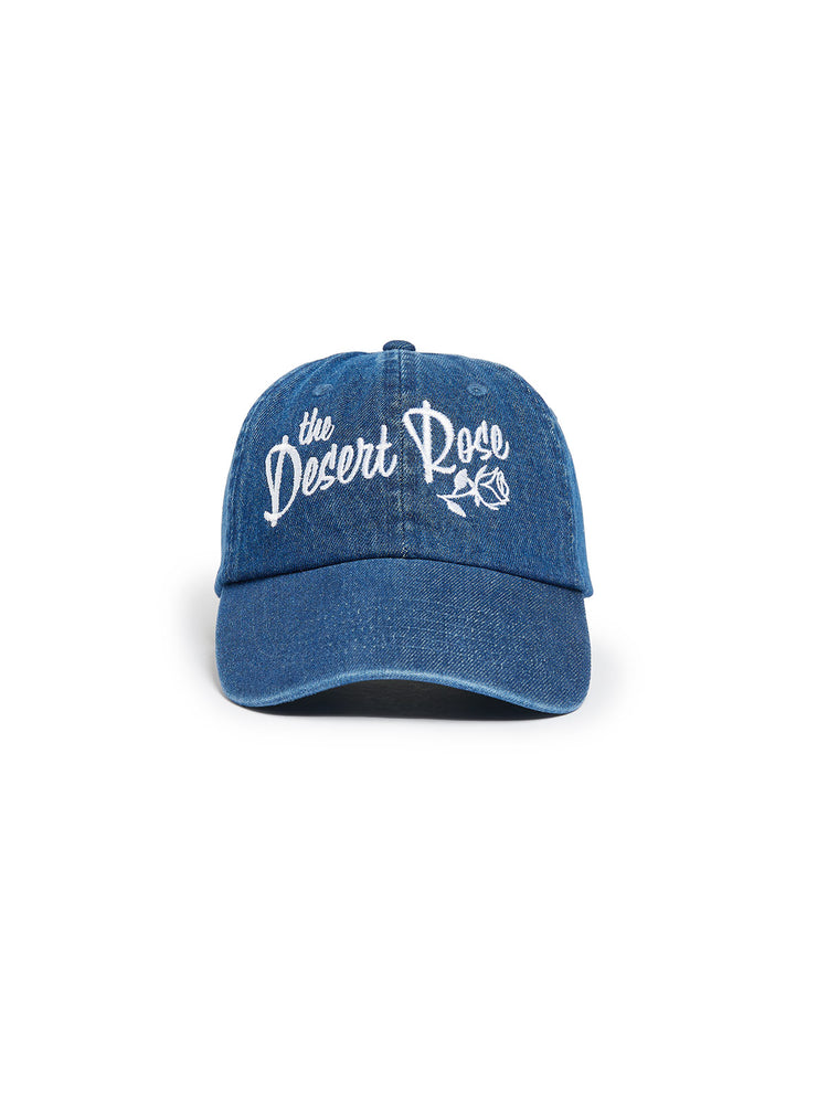 Blue denim cap with white text on a white background