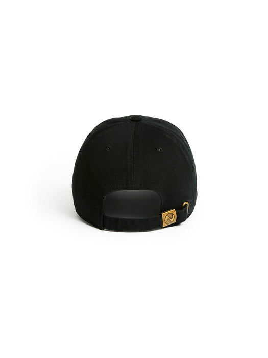 A black baseball cap shown from the back, featuring a black adjustable strap with a small gold-tone metal logo badge on the side, set against a plain white background.