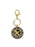 Gold keychain with black circular emblem featuring text and a logo on a white background