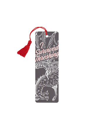 Bookmark with tassel featuring a horse and text on a white background