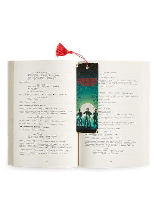 Open book with a bookmark featuring a band on a white background