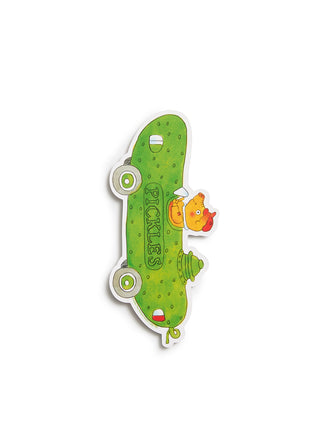 A bookmark shaped like a green pickle, featuring a pig peeking out from the side and the word 'PICKLES' printed vertically. The bookmark has a white border and is shown on a plain white background.