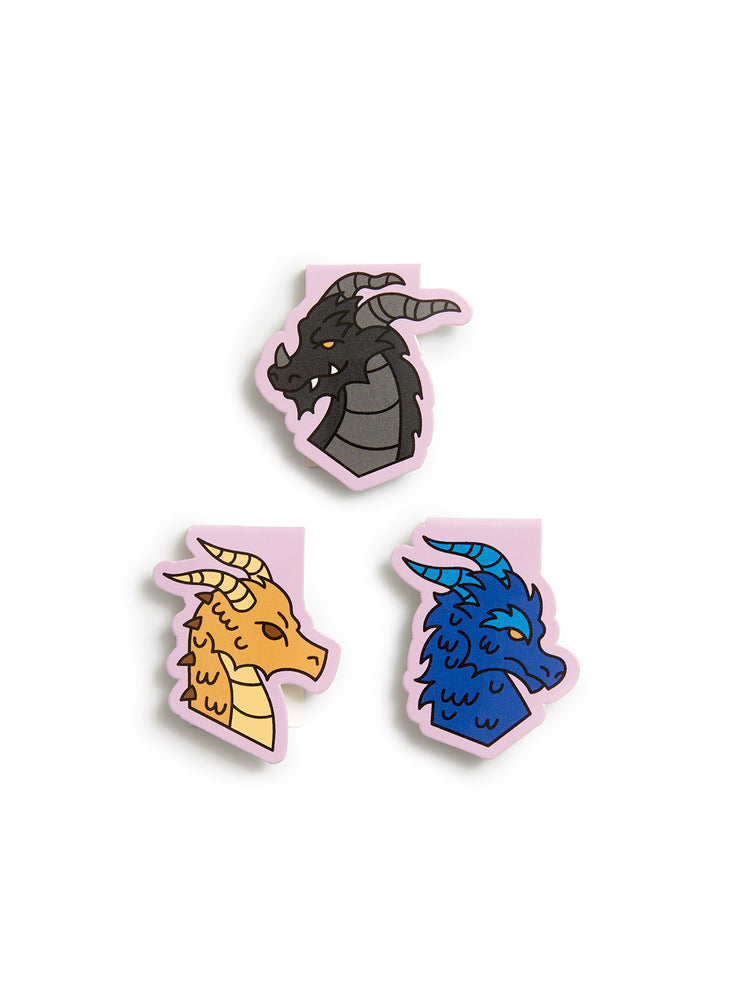 Three dragon head stickers with pink borders on a white background, featuring a dark gray dragon, a golden-yellow dragon, and a blue dragon.