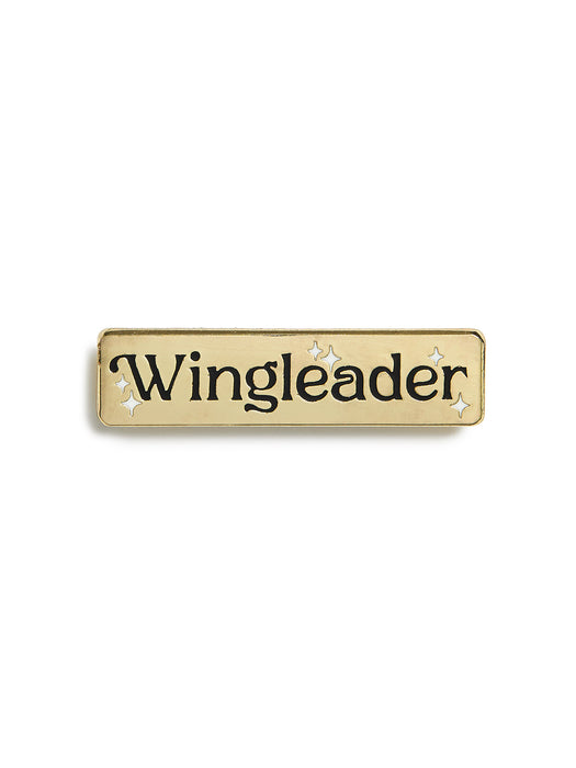 Gold nameplate with 'Wingleader' text on a white background