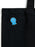 A close-up of a black canvas tote bag with a blue and gold enamel pin on the front that reads 'WORST VICTOR IN HISTORY'.