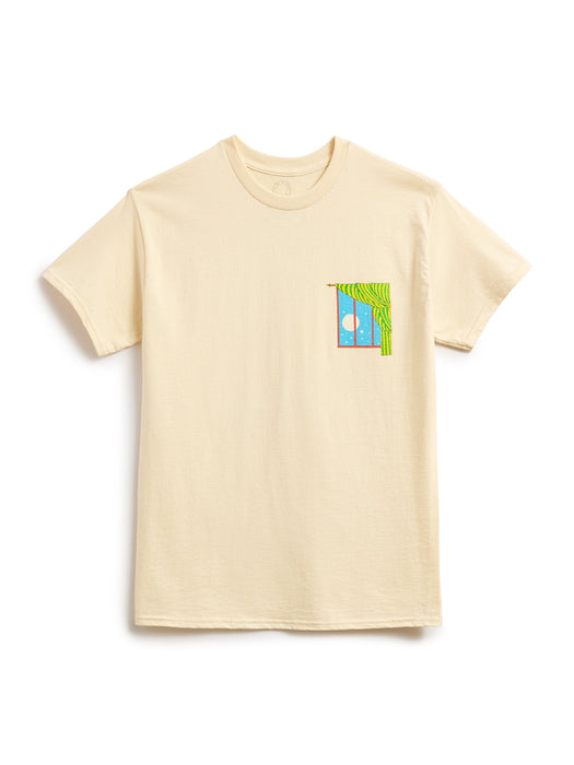 A light beige crewneck t-shirt with a small colorful graphic on the left chest depicting a window, a blue sky, and a full moon, shown on a plain white background.