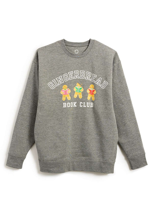 A heather gray crewneck sweatshirt featuring a graphic on the front that reads 'GINGERBREAD BOOK CLUB' in white arched text above three gingerbread characters holding books, shown against a plain white background.
