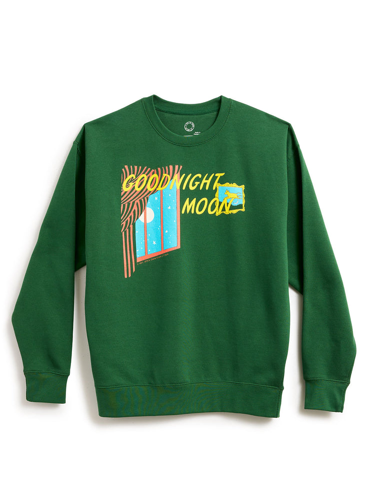 A green crewneck sweatshirt featuring a colorful graphic print on the front with the text 'GOOD NIGHT MOON' and a stylized moon illustration, displayed against a plain white background.