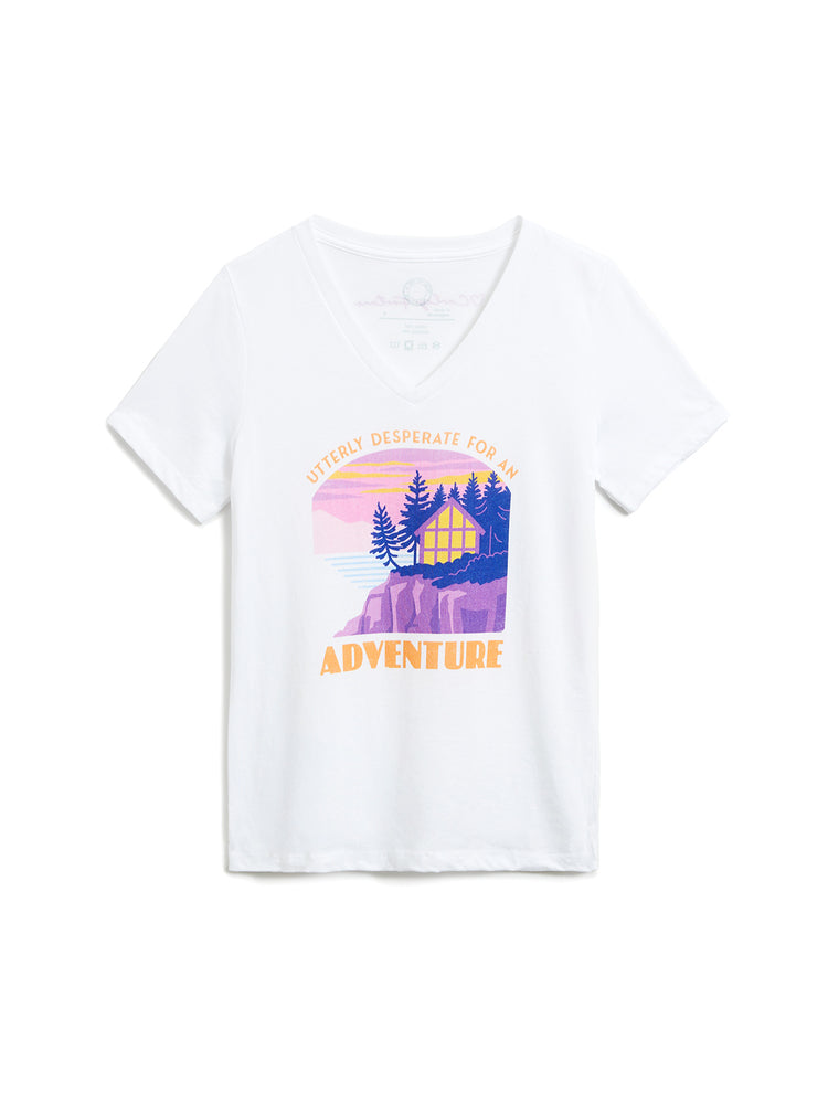 White t-shirt with a graphic of a cabin and trees on a white background