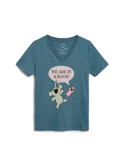 Blue t-shirt with cartoon design and text 'We are in a book!' on a white background
