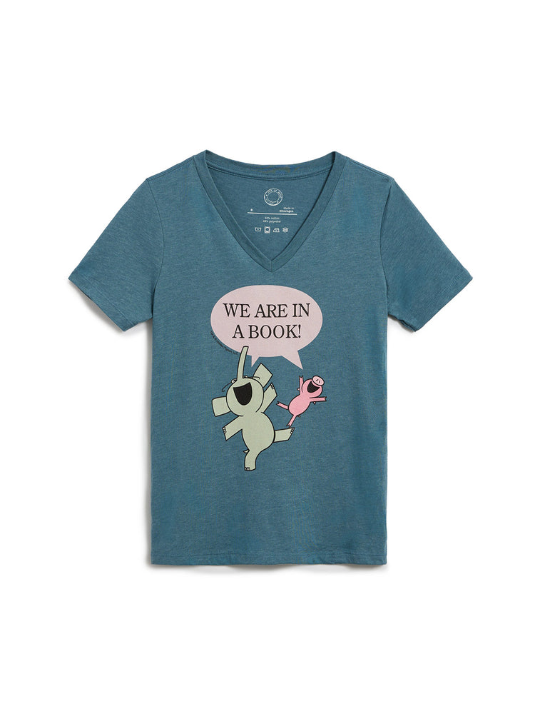 Blue t-shirt with cartoon design and text 'We are in a book!' on a white background
