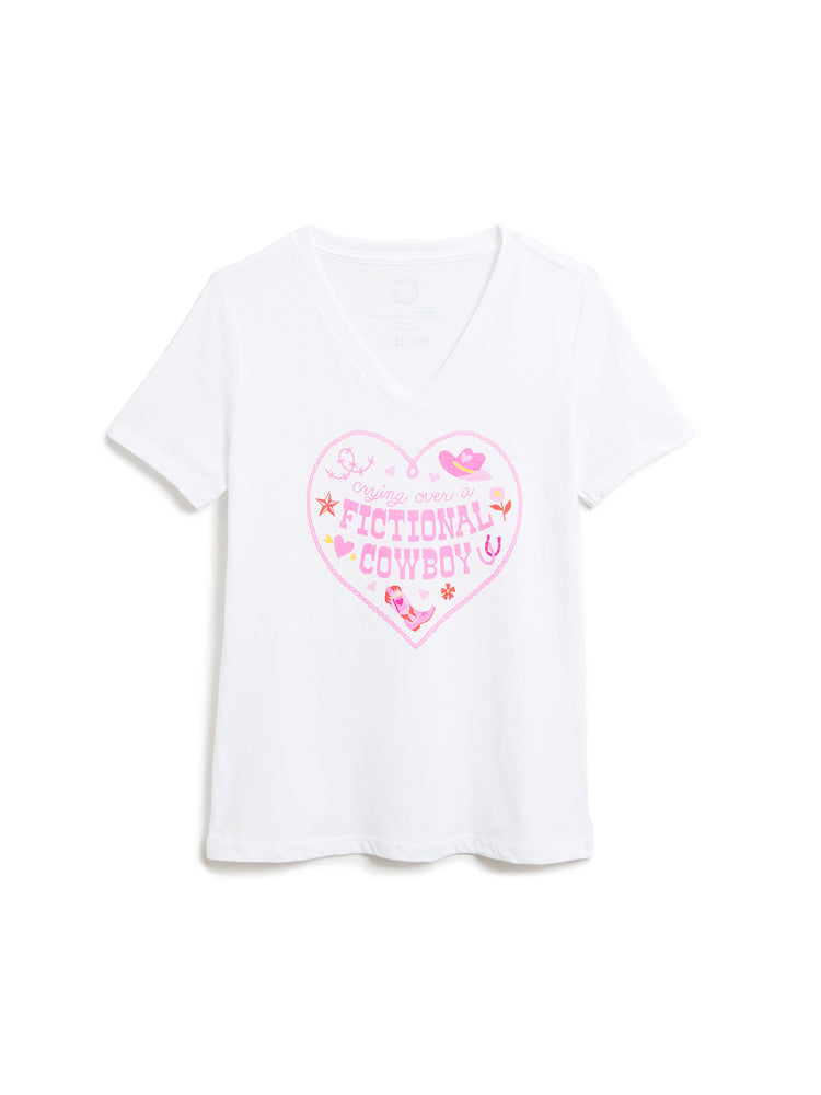 A white short-sleeve V-neck t-shirt with a pink heart graphic on the front that reads 'crying over a fictional cowboy', displayed against a plain white background.