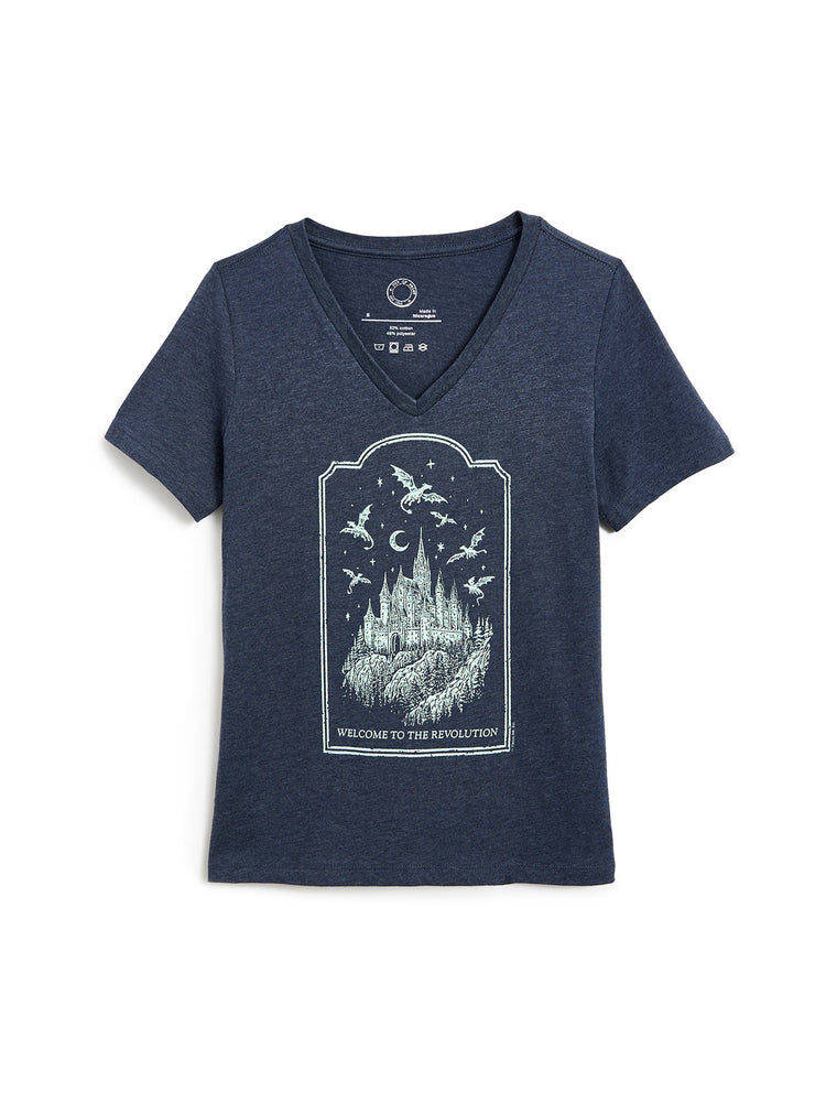 A navy blue heather V-neck t-shirt with a light blue graphic print of a castle under a night sky with dragons and the text 'WELCOME TO THE REVOLUTION'.