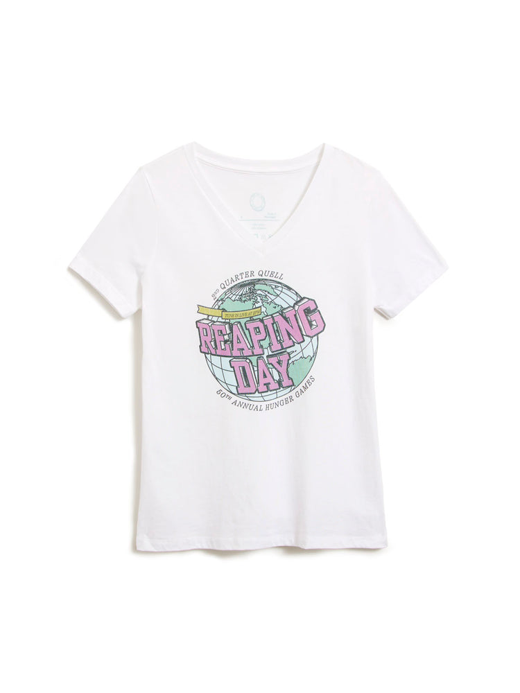 A white short-sleeve V-neck graphic t-shirt featuring a retro circular design with the words 'Reaping Day' in pink and a globe graphic, displayed on a clean white background.