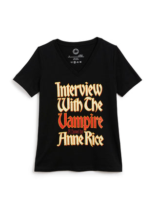 A black short-sleeve v-neck t-shirt featuring a stylized graphic print on the front that reads 'Interview With The Vampire' in a gothic font, with 'A Novel by Anne Rice' printed below in red.