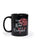 Black mug with red rose design and text on a white background