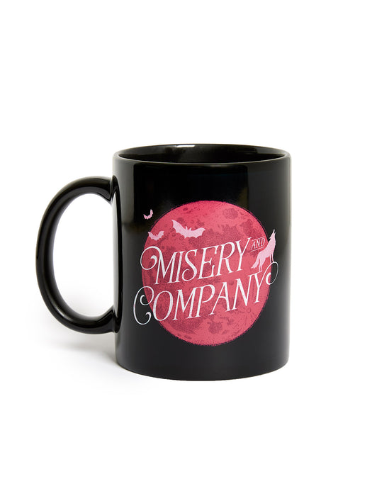 Black mug with pink graphic and text on a white background