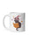 A white ceramic mug featuring a cartoon illustration of a black cat wearing a purple witch hat and reading an orange magic book, surrounded by small stars.