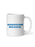 A white ceramic mug with the phrase 'HANUKKAH MENSCH' printed in blue rounded letters on the front, set against a plain white background.
