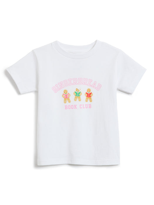 A white short-sleeve kids' t-shirt featuring a 'Gingerbread Book Club' graphic on the chest with three gingerbread illustrations reading books and pink lettering, displayed on a clean white background.