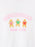 White crewneck t-shirt featuring a graphic print of three gingerbread cookies reading books under the words 'GINGERBREAD BOOK CLUB' in pink arched lettering.