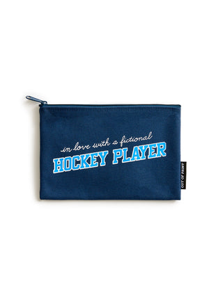 Navy blue pouch with text 'I'm love with a fictional hockey player' on a white background