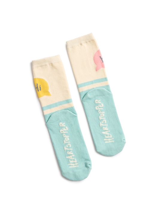 Two socks with colorful designs and text on a white background