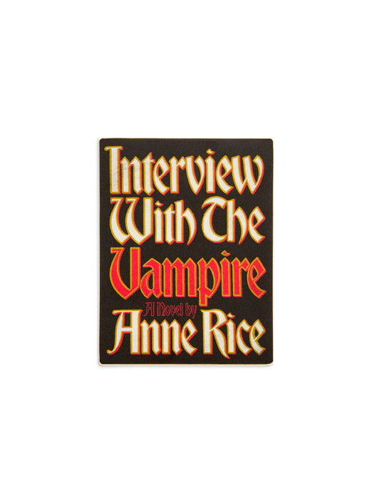 A rectangular book cover enamel pin product on a plain white background, featuring the title text 'Interview With The Vampire' in stylized cream and red lettering with 'A Novel by Anne Rice' below.