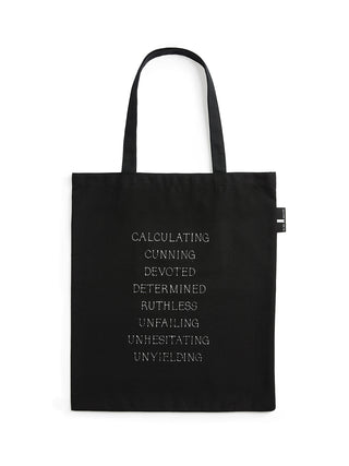 Black tote bag with white text on a white background