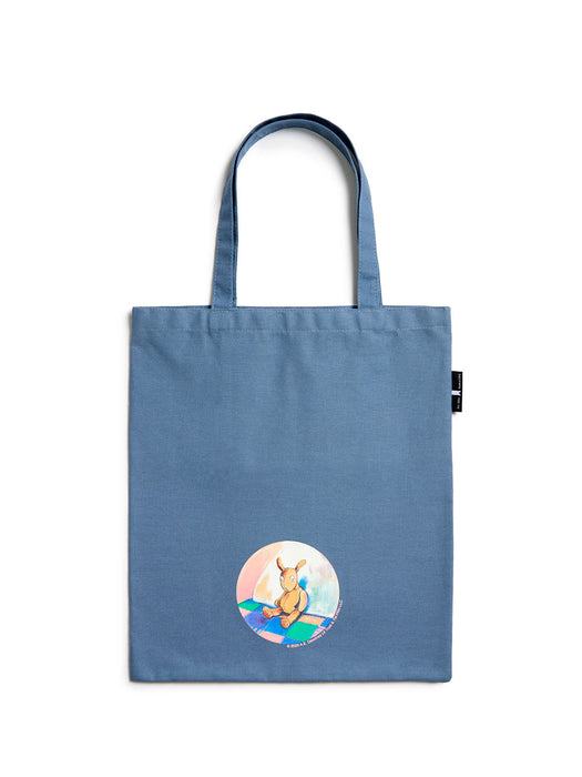 Blue tote bag with a plush graphic on a white background
