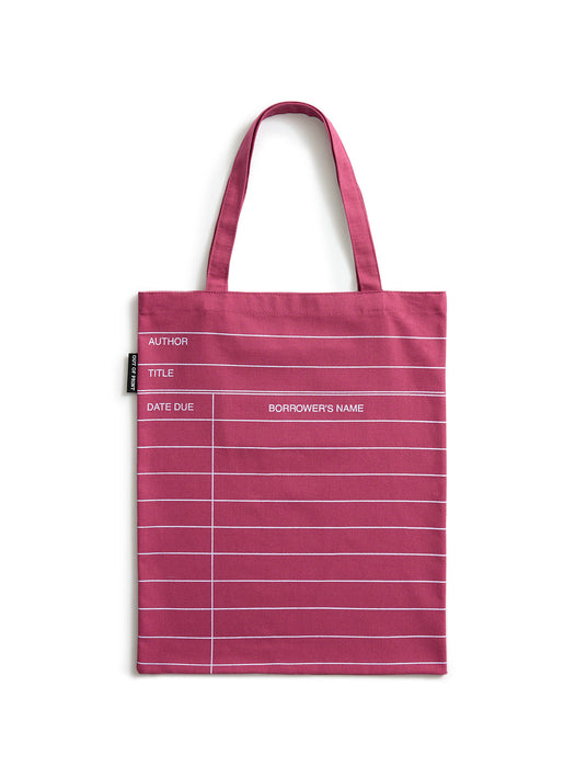 A maroon red canvas tote bag with white horizontal lines and printed text fields for author, title, date due, and borrower's name, shown on a plain white background.