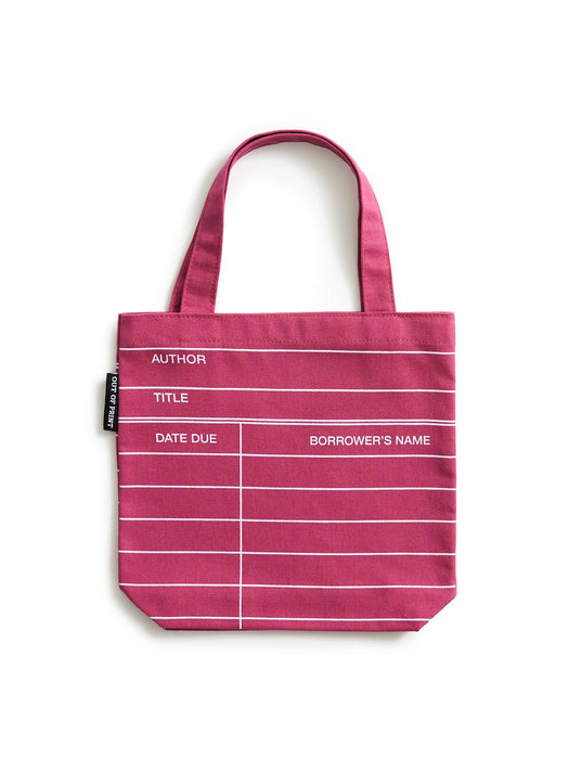 A maroon red canvas tote bag with white horizontal stripes and printed white text fields for author, title, date due, and borrower's name, shown on a plain white background.