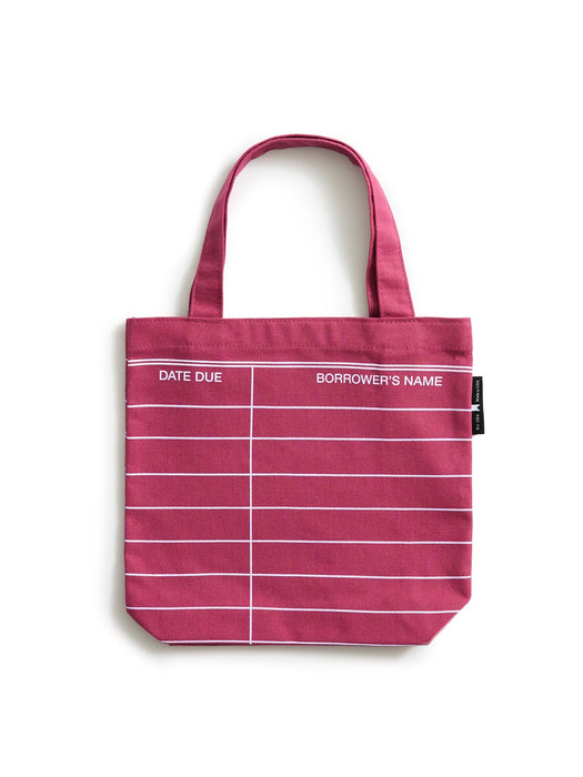 A maroon red canvas tote bag with white horizontal lines and columns, featuring the headers 'DATE DUE' and 'BORROWER'S NAME' printed in white. The bag has two top handles and a small black tag on the right side.