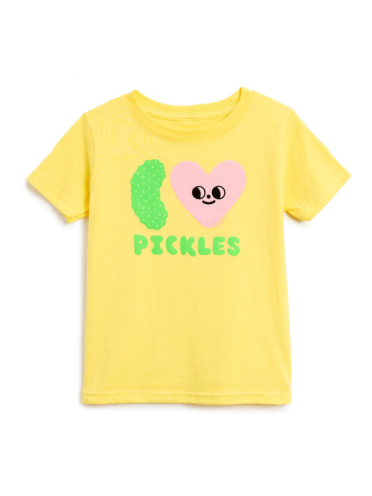 A yellow short-sleeve kids' t-shirt featuring a graphic of a green pickle and a pink heart with a face, above the word 'PICKLES' in green, shown on a plain white background.