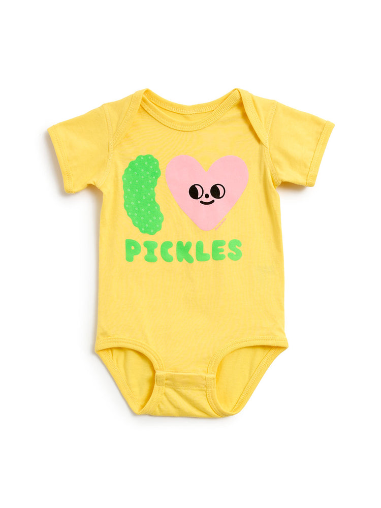 A yellow short-sleeve baby bodysuit featuring a graphic design that reads 'I [heart] PICKLES' with a green pickle and a pink smiling heart.